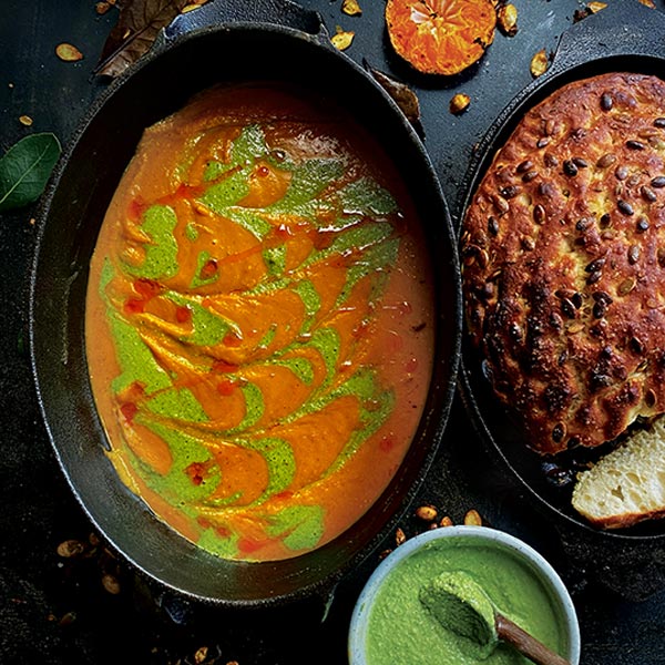 Roasted pumpkin and mandarin soup with a coriander sesame cream on top. Focaccia bread on the side.